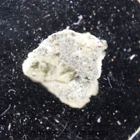 Mvskoke Merkv - L6 Ordinary Chondrite - Partial Slice - 0.085g - USA (Oklahoma)