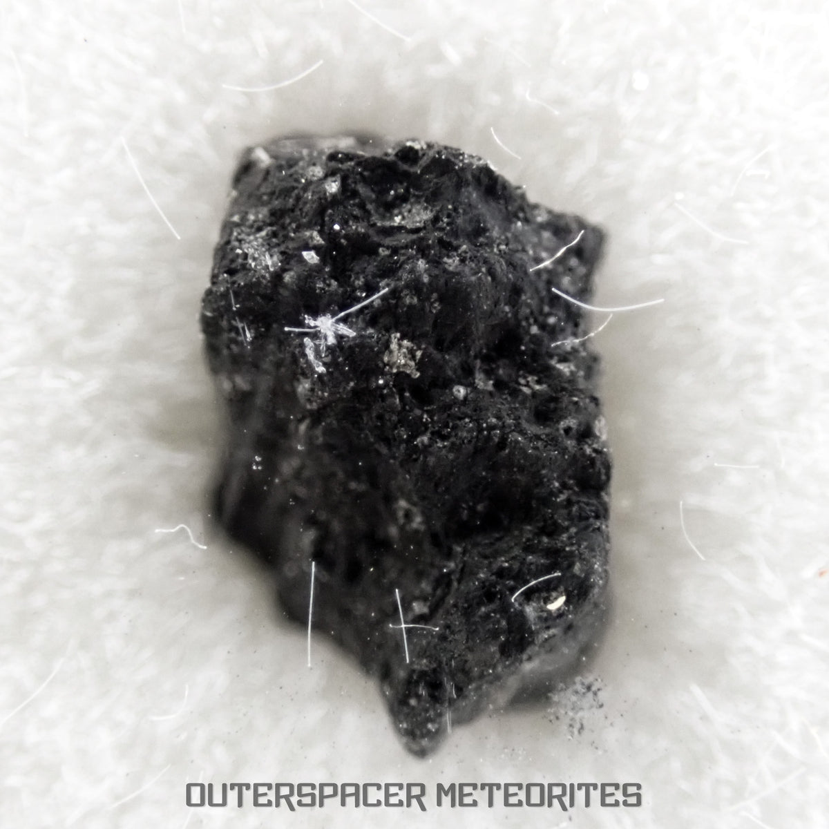 Winchcombe - Condrita carbonácea CM2 - Fragmento - 0.066 g - Inglaterra (Gloucestershire)