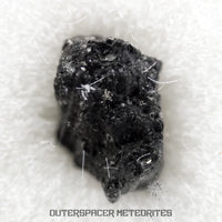 Winchcombe - Condrita carbonácea CM2 - Fragmento - 0.066 g - Inglaterra (Gloucestershire)